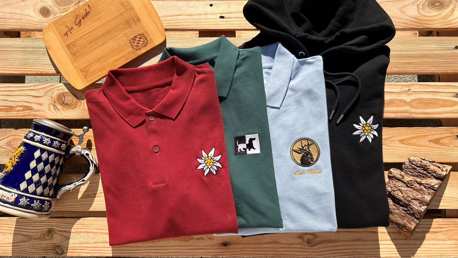 Bayerische Poloshirts T-Shirts und Hoodies bestickt in Bayern mit Motiven wie Dackel Traktor Edelweiss Wolpertinger oder dem bayerischen Wappen von BavaRosi Fashion